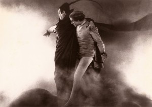 Emil Jannings as Mephisto councils Gösta Ekman as Faust in "Faust."