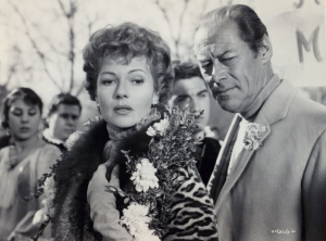 Rita Hayworth and Rex Harrison in "The Happy Thieves."