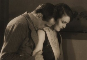 Miles Mander comforts Madeleine Carroll in "The First Born."