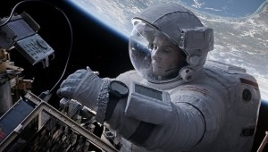 Sandra Bullock, as Ryan Stone, works on the space shuttle in "Gravity."