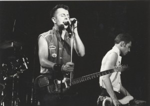 Joe Strummer, performing in The Clash.