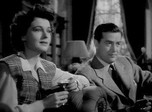 Ruth Hussey and Ray Milland deal with ghosts in "The Uninvited."